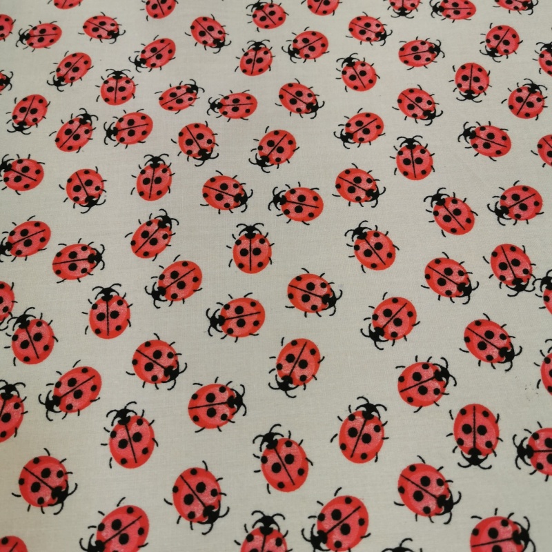 Red Ladybirds on Silver Polycotton